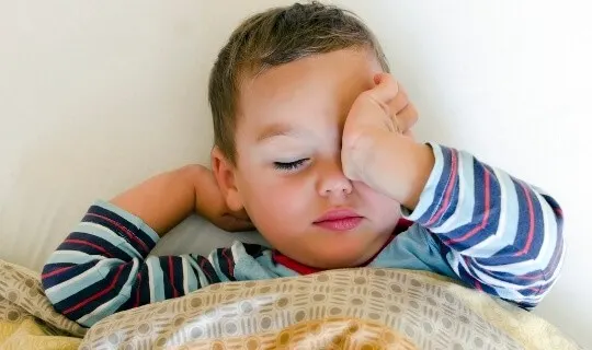 sleepy toddler at bedtime