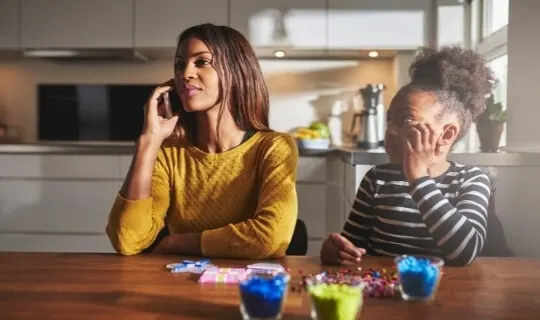 mother on phone disconnected from child