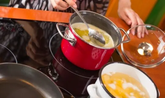 use a spoon to skim fat off soup