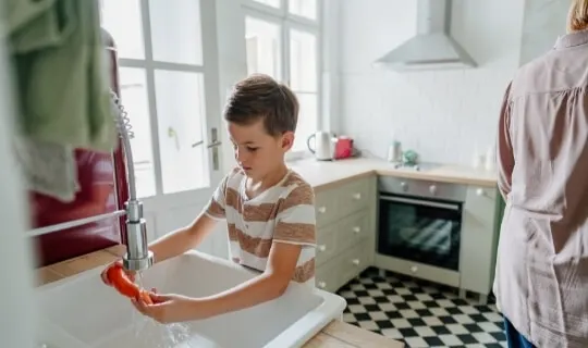 child doing chores