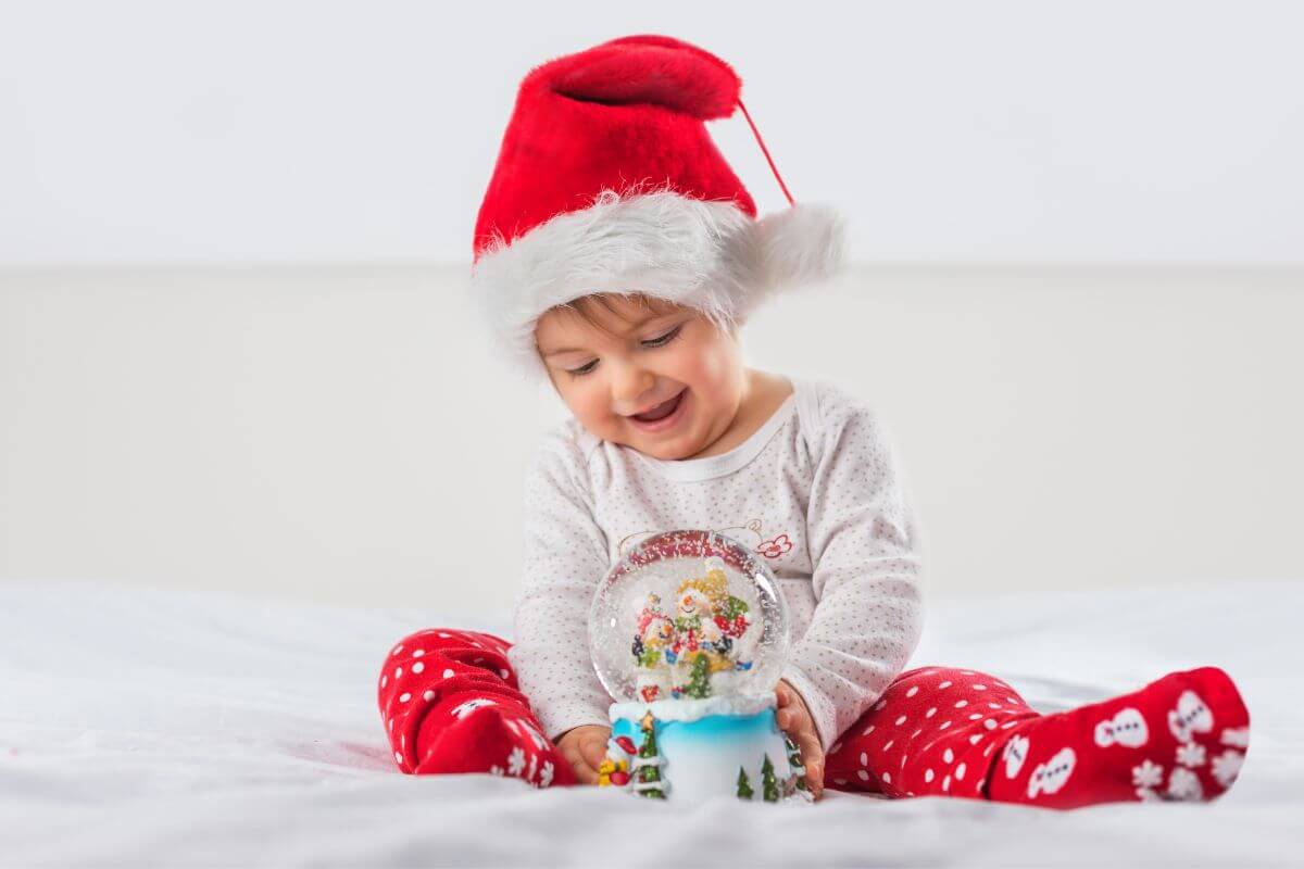 toddler in a santa hat